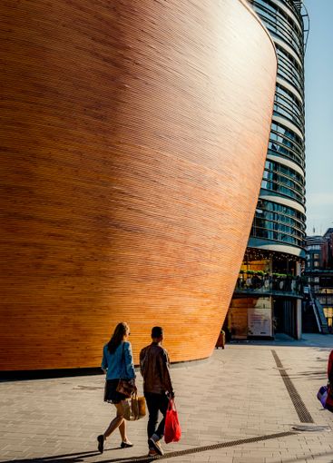 Couple walking on street in Helsinki, Finland