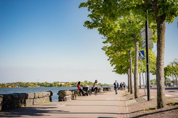 Pedestrians on waterfront in Helsinki, Finland