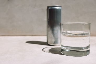 Close-up of a glass of pure mineral water and a mock-up...