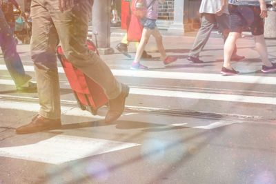Pedestrians crossing a street.