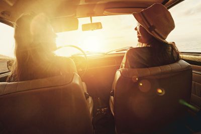 Woman, friends and road trip for sunset travel, summer...