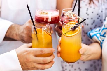 Close-up of male and female hands with elegant glasses....