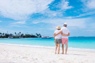 Close-up of young married couple in shorts and T-shirts